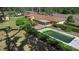 Side yard view of a single-story home with an in-ground pool and a screened-in patio at 2919 Griffin Rd, Leesburg, FL 34748