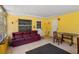 Bright sunroom with tile floors, brick accents, and multiple entry doors at 2919 Griffin Rd, Leesburg, FL 34748
