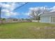 Large backyard featuring a fence, providing privacy and ample space for activities at 2937 Garret St, Deltona, FL 32738