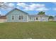 Charming home featuring a well-maintained lawn and plenty of natural light at 2937 Garret St, Deltona, FL 32738