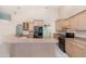 Modern kitchen with a breakfast bar, updated appliances, and ample counter space at 3 Whipper In Cir, Ormond Beach, FL 32174