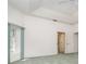 Spacious main bedroom with high ceilings, ceiling fan, green carpet, and multiple windows at 3 Whipper In Cir, Ormond Beach, FL 32174