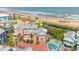 Aerial view of beach home with a pool and a beachfront location at 3000 Ocean Shore Blvd # 6, Ormond Beach, FL 32176