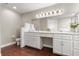 Bathroom featuring double sinks, white cabinetry, and ample counter space for a clean and organized feel at 3000 Ocean Shore Blvd # 6, Ormond Beach, FL 32176