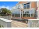 A charming home featuring a multi-level deck, perfect for enjoying the outdoors and entertaining guests at 3000 Ocean Shore Blvd # 6, Ormond Beach, FL 32176