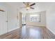 A bedroom featuring hardwood floors, a ceiling fan and sliding glass door at 313 Dirksen Dr # G4, Debary, FL 32713