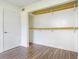 Functional closet with wood laminate flooring and multiple shelves for organized storage at 313 Dirksen Dr # G4, Debary, FL 32713