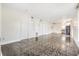 Spacious living room featuring tiled floors and multiple storage closets at 313 Dirksen Dr # G4, Debary, FL 32713