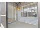 Cozy patio with sliding door and window offering natural light and space at 313 Dirksen Dr # G4, Debary, FL 32713