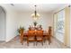 Formal dining room with chandelier, perfect for Gathering gatherings at 319 E Victoria Trails Blvd, Deland, FL 32724