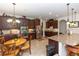 Gourmet kitchen features stainless steel appliances, granite countertops, and wooden cabinets at 319 E Victoria Trails Blvd, Deland, FL 32724