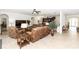 Spacious living room featuring tile flooring, recessed lighting, and comfortable seating at 319 E Victoria Trails Blvd, Deland, FL 32724