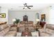 Living room featuring tile flooring, recessed lighting, and comfortable seating at 319 E Victoria Trails Blvd, Deland, FL 32724