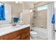 Bathroom showcasing vanity with drawers, toilet and tiled shower/tub at 341 Chelsea Place Ave, Ormond Beach, FL 32174