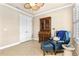 Inviting office space with ceiling fan, tile flooring, vintage furniture, and natural light at 341 Chelsea Place Ave, Ormond Beach, FL 32174