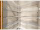 Spacious walk-in pantry with ample white wire shelving for organized storage at 341 Chelsea Place Ave, Ormond Beach, FL 32174