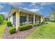 Cozy screened-in patio is perfect for outdoor dining and relaxation at 341 Chelsea Place Ave, Ormond Beach, FL 32174