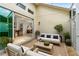 Outdoor patio offers stylish seating and seamless indoor-outdoor living at 341 Chelsea Place Ave, Ormond Beach, FL 32174