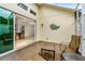 Patio area provides a seamless transition to indoors with a sliding glass door entrance at 341 Chelsea Place Ave, Ormond Beach, FL 32174