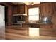 Well-equipped kitchen with countertops, modern appliances, and ample cabinet storage at 34416 Oak Ave, Leesburg, FL 34788