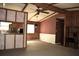 Open-concept living area with adjacent kitchen, ideal for entertaining and everyday living at 34416 Oak Ave, Leesburg, FL 34788