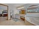 Bright bathroom showcases a soaking tub, vanity with granite countertop, and tile floors at 349 Evansdale Rd, Lake Mary, FL 32746