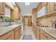 Bright eat-in kitchen features light-colored cabinets, granite countertops, and stainless steel appliances at 349 Evansdale Rd, Lake Mary, FL 32746