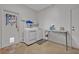 Functional laundry room with washer, dryer, folding table and exterior access at 349 Evansdale Rd, Lake Mary, FL 32746