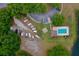Overhead view of community boat storage with parking, pool, and lush landscaping at 4029 N Waterbridge Cir, Port Orange, FL 32129