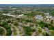 Aerial view displaying the neighborhood's proximity to Palmer College of Chiropractic and a community pool at 4029 N Waterbridge Cir, Port Orange, FL 32129
