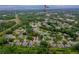 Aerial view of home showcasing a backyard pool in a lush, green neighborhood near Publix at 4029 N Waterbridge Cir, Port Orange, FL 32129