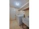 Functional laundry room equipped with a washing machine, dryer, and utility sink at 4029 N Waterbridge Cir, Port Orange, FL 32129