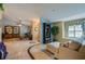 Inviting living room featuring tile flooring, comfortable seating, and an open layout at 4029 N Waterbridge Cir, Port Orange, FL 32129