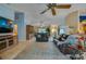 Inviting living room with tile floors, comfortable seating, and a cozy atmosphere for relaxation at 4029 N Waterbridge Cir, Port Orange, FL 32129