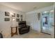 Comfortable room includes a recliner, closet, and an entry to the primary bedroom at 4029 N Waterbridge Cir, Port Orange, FL 32129