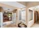 Bright foyer boasting tiled floors, plenty of natural light, and dining area at 411 Columbus Ave, Orange City, FL 32763