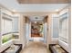 The light-filled entryway with tiled floors and views into the dining area offers a warm welcome at 411 Columbus Ave, Orange City, FL 32763