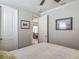 Bedroom boasts natural light, neutral decor and a ceiling fan with crown molding at 425 Wedgeworth Ln, Deland, FL 32724