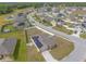Expansive aerial view of the community featuring well-maintained homes and neighborhood streets at 4273 Ne 29Th Pl, Ocala, FL 34470