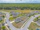 High aerial view of a residential neighborhood with spacious yards and community roads at 4273 Ne 29Th Pl, Ocala, FL 34470