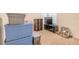 Finished basement with carpeted floors, media area and storage; great for a play area or storage at 4273 Ne 29Th Pl, Ocala, FL 34470