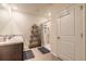 Bright bathroom showcasing dual sinks, walk-in shower, and linen storage, creating a functional space at 4273 Ne 29Th Pl, Ocala, FL 34470