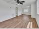 Bright bedroom featuring stylish wood-look flooring and fresh, white walls at 430 S Woodward Ave, Deland, FL 32720