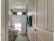 Bathroom showcasing granite countertops, wooden cabinets, a shower with glass doors, and neutral decor at 4503 Colony Rd, New Smyrna Beach, FL 32168
