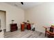Neutral office features wood flooring and a wooden desk and filing cabinet at 4503 Colony Rd, New Smyrna Beach, FL 32168