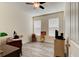 Bright office room featuring light walls, hardwood floors, a ceiling fan, and wood furniture at 4503 Colony Rd, New Smyrna Beach, FL 32168
