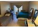 Cozy bedroom with two beds, a desk, and window with curtains at 4555 Tower Pine Rd # Ge, Orlando, FL 32839