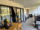 A spacious patio with a dining table and grill at 4555 Tower Pine Rd # Ge, Orlando, FL 32839