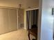 Multi-purpose room featuring a built-in closet and space for a desk at 4555 Tower Pine Rd # Ge, Orlando, FL 32839