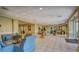 Inviting lobby area with comfortable seating and a clean, tiled floor at 4670 Links Village Dr # B102, Ponce Inlet, FL 32127